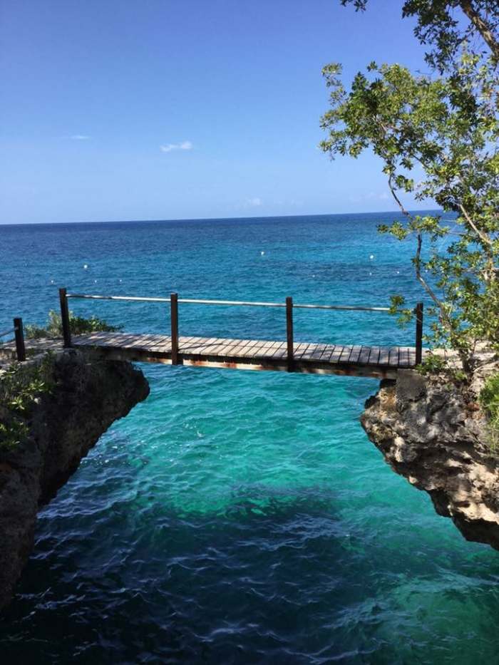 A section of the beach at Negril where the clearest blue water and white sands make visitors never want to leave.