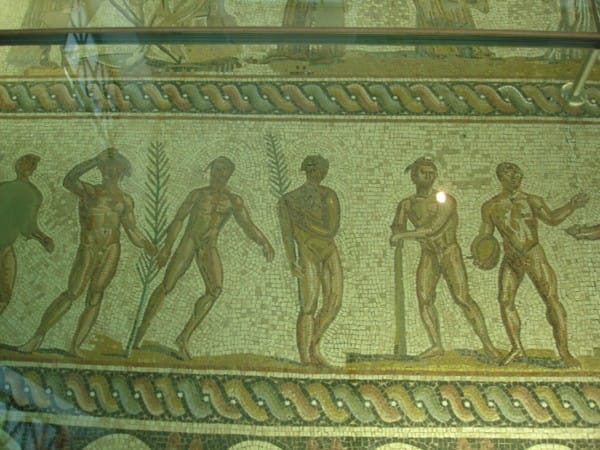 Mosaic flooring depicting the winners of various events wearing wreaths.