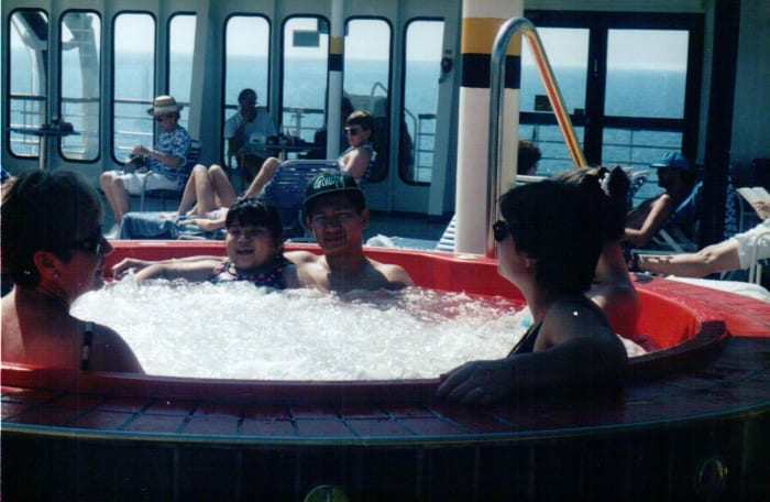 But for most families with children on the spectrum, it's anything but. Here's a photo of me and my late father chilling out in the whirlpool on the Carnival Fantasy in February 1996.