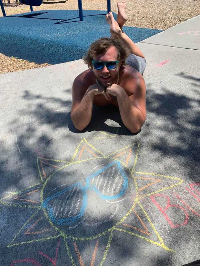 Me in Riverside County, CA, not wearing a mask at the peak of SARS-CoV-2 and laying on the ground.
