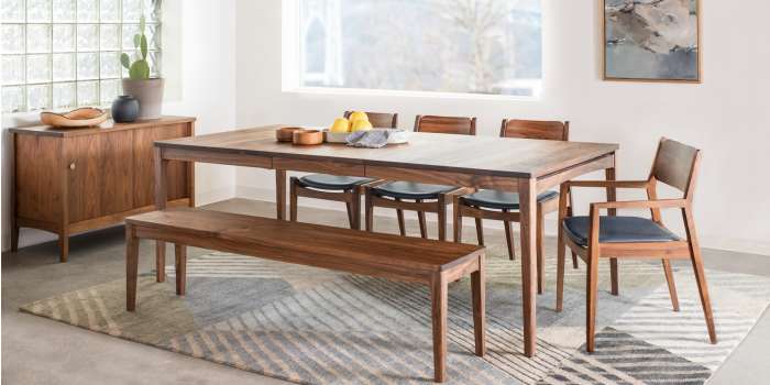 Handcrafted solid wood is inspired by Mid-Century modern wood furniture. The dining table is the solid top and has the extension leaves.