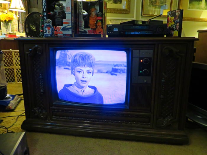Quasar Color Console Television Model WL9439SP captured her image so well, no distortions or anything and the sound is amazing. The CRT really makes these old VHS tapes look amazing.