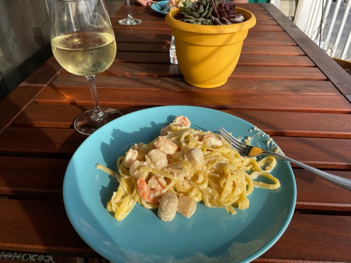 This dish is perfect for warmer weather. The lightness of the sauce, the bright citrus flavor, and the delicate seafood are fantastic on a hot day.