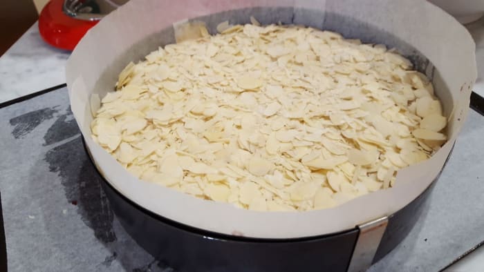 I prefer to use expandable cake rings rather than cake pans. One ring can be turned into any size cake pan you like. Just place the ring on a baking sheet and away you go!