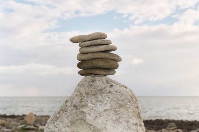 Stone balancing is a popular art. These balanced stones were photograped by the author at the spa resort, "Jackie's on the Reef," in Negril, Jamaica, West Indies.