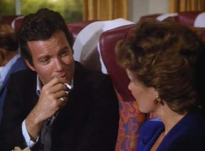 Suave Stuart Peters (William Shatner) lures Paula Harvey (Yvette Mimieux) into his web of lies sans pornstache