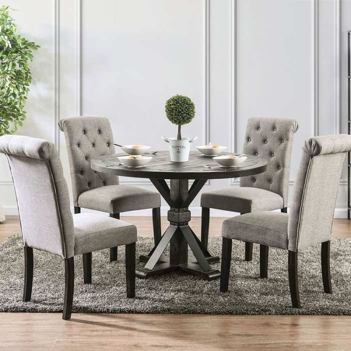 Featuring a wood table top, pedestal base, and metal accents, the table has a timeless look you will enjoy for years to come.