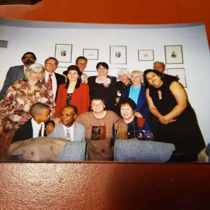 Bottom Row: grandson Nathan, Ernest, Patty, and Aunt Mary. Middle Row: Bea, Danielle (Paul's wife,) Aunt Donna, and Angie. Back Row: Philip, Paul, John (Connie's husband,) Connie, Mom, and Dad