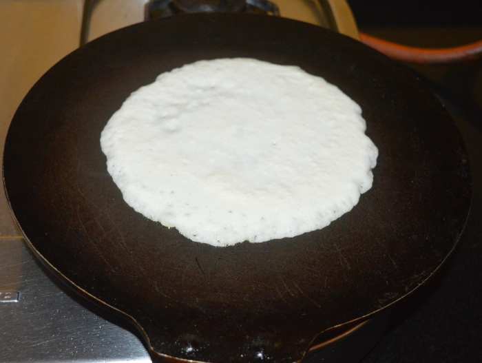 Just before making uttapam, add eno fruit salt or baking powder. Add a teaspoon of water and gently mix. Now the batter is ready for making uttapam.