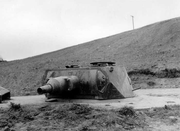 Tank turret of a Mark IV mounted on a Tobruk at one of the strong points on Omaha Beach, June 1944.