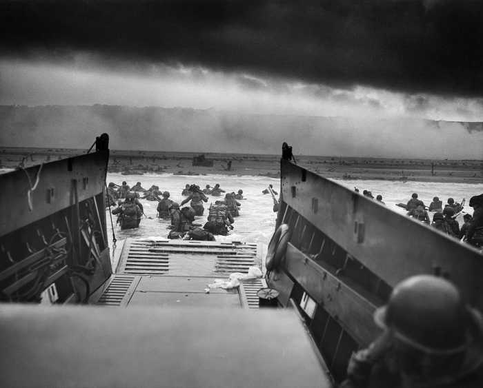 Through the fog of war American troops of the 1st Infantry Division wade ashore onto the killing field known as "Omaha Beach" on D-Day June 6,1944.