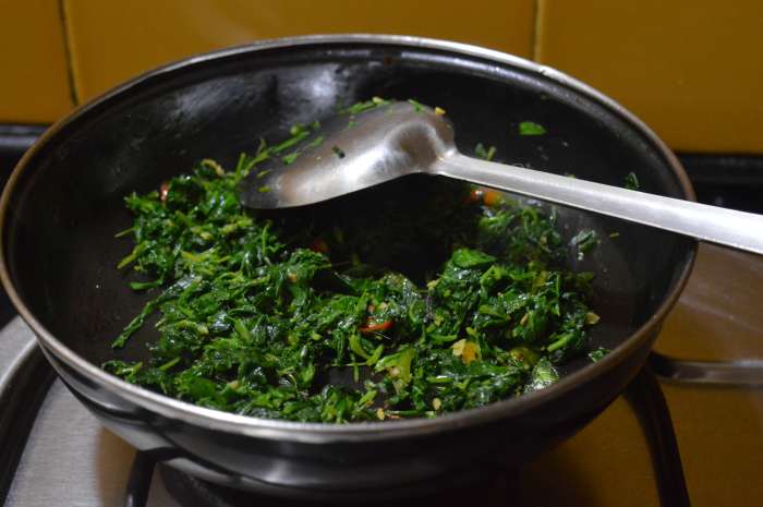 Step two: Heat oil in a pan. Add cumin seeds. Once they crackle, add finely chopped ginger, garlic, and green chilies. Saute the mixture for a minute on low heat. Add fenugreek leaves. Saute for 4-5 minutes.