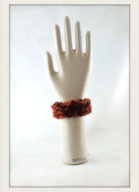 Let me give you a hand selling on Etsy. On RetroChalet, vintage glove molds range about $36-$45.