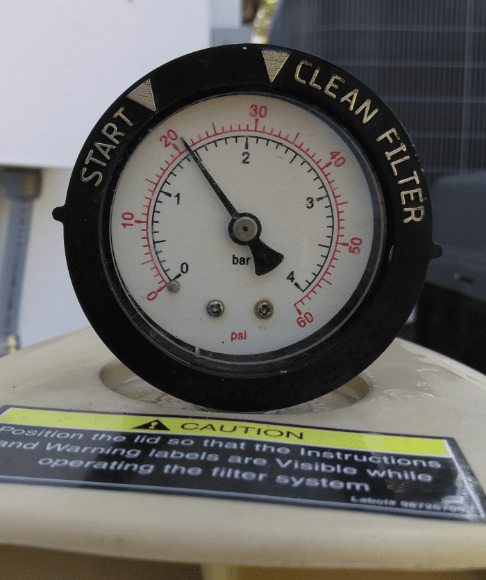 Take note of what the pressure (PSI) is after pump is running and fresh DE powder has been added. This is the "clean" filter pressure. Backwash when PSI exceeds more than 5 PSI over clean filter pressure.