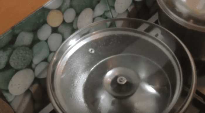 Make sure there's enough room to still place an upside-down glass pot lid on top of the bowl and pot.