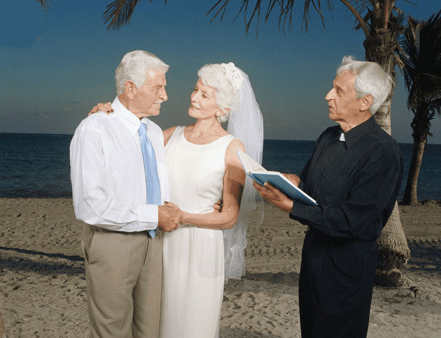 Yes, you can wear a white wedding dress, a stunning bit of glitterati, or even a smart suit. Up to you!