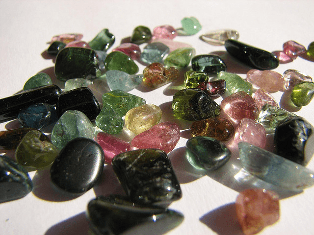 tourmaline--it comes in shades of pinks and greens. The black protects you from those who wish you harm.