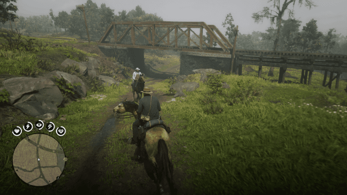 As you follow the road you'll have to climb up to the left to reach this train bridge. And no I didn't run into Colonel Sanders (literally) while taking this screenshot.