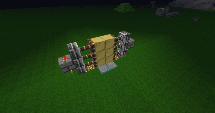 A bare look at sliding redstone doors. Note that the pistons can be hidden by adding blocks in front of them so that the only thing seen are the golden blocks.