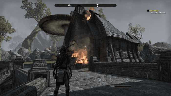 A burning building in Muth Gnaar, a ramshackle village in Mournhold during the events of The Elder Scrolls Online.