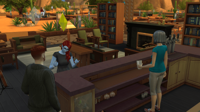 Sims interacting over a drink in "The Sims 4."