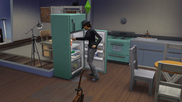 A sim fixing a fridge using Handiness in "The Sims 4." Don't send a low-level sim to do this, as they may accidentally electrocute themselves.
