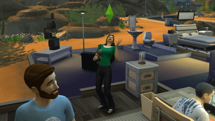 A sim cackling maniacally after fiddling with a Voodoo Doll in "The Sims 4." Voodoo Dolls can be used to manipulate the emotions of other sims.