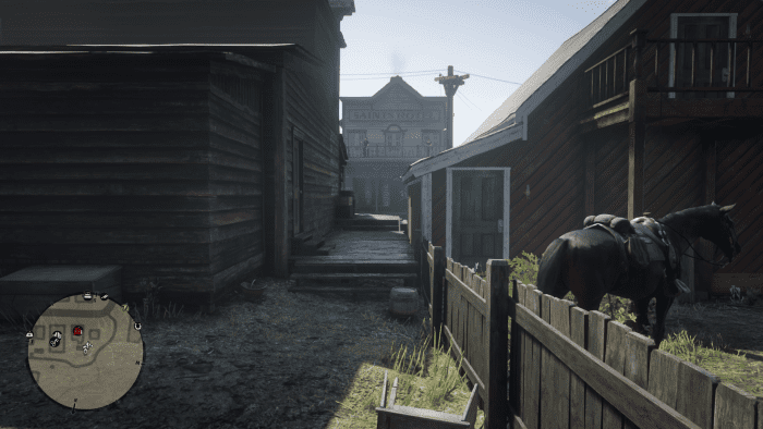The back alley of the General Store in Valentine. Go in through the front door and use this back way as your escape route.