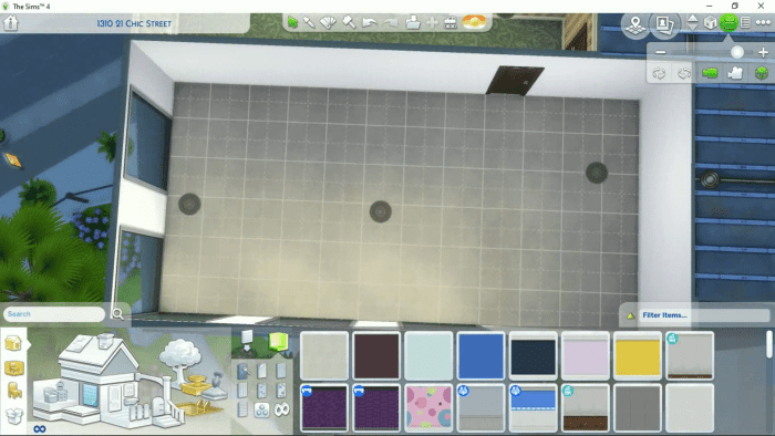 I Like to Make the Space a "Blank Slate" Before I Start Decorating: Here is the gutted apartment I was working on in build mode. I have just a few lights in the room. You can see the tool bars I mention above here.