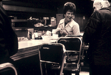 WiKiMedia Common /Seattle Municipal Archives Waitress taking order at Pkes Place Market Seattle.