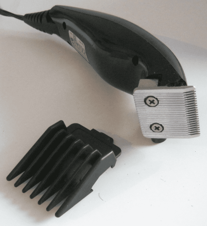Using electric clippers without the guard, cut your hair down to stubble.