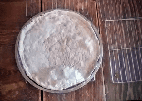 Cool crusts on racks a few minutes. You may begin adding toppings, beginning with tomato sauce, almost immediately…but it is wise to allow some steam to escape first.