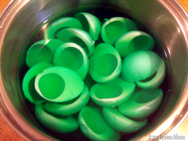 Step 3: Dye the egg whites green. Place the halved egg whites in the pot of green water