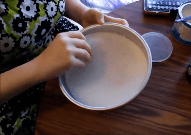 Not only do you need to lay the parchment in the pan perfectly, you need to make sure to press it down so there aren't any air bubbles.