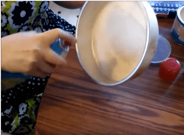 Hold your pan away from the spray farther than this. If you don't, you'll end up with a puddle of spray and that's not ideal.