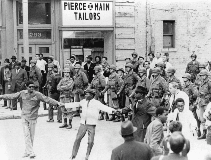 The strike demonstrators of Memphis display a "line of solidarity" during the 1968 sanitations workers protests.