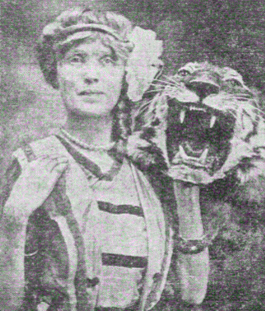 Mabel Stark and one of her favorite tigers. In 1916, she adopted an orphan Bengal tiger cub as her own and named him Rajah.