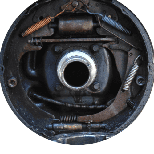 Here it is! The first look at the drum brakes in over 15 years! Wow, the shoes are worn down but there hasn't been any metal scoring.