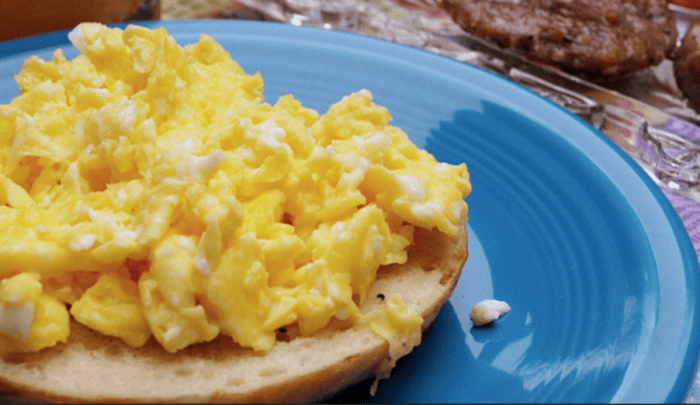 Toasting and topping day-old bagels with eggs or melted cheese is a great way to save money on breakfast and you'll never taste the difference.