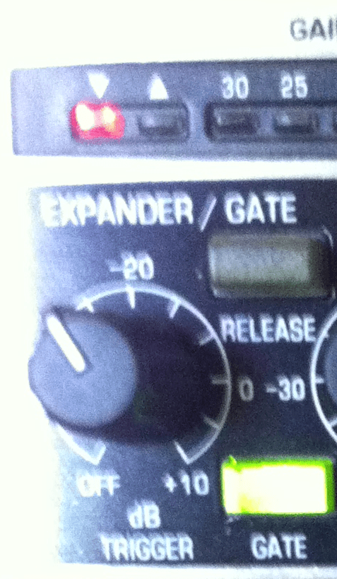 Close-up of expander / gate. With trigger set a little below -20dB, GATE switch (on), release switch (off). The red led with down-pointing arrow is lit because the signal coming in is below the threshold set by trigger.