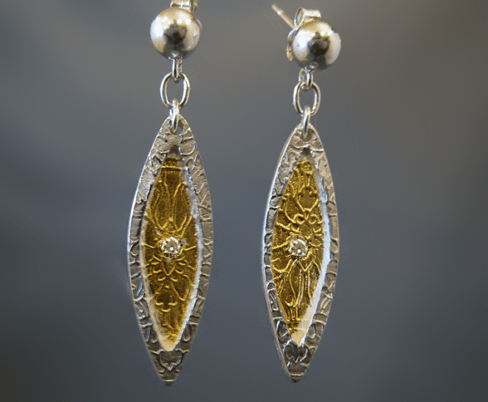 Fine silver marquise earrings with 24k gold keum-boo accents and embedded fire-in-place CZ (cubic zirconia) stones.