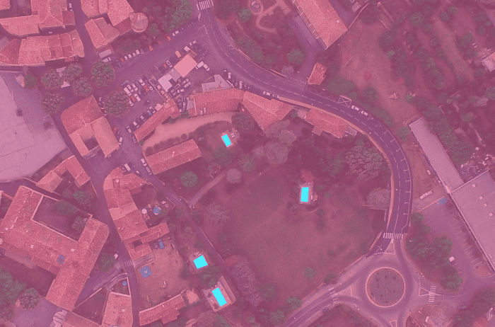 After applying deep learning techniques and training the algorithm,4 pools were classified in the image. Note that there are actually 3 pools (see original image). This means that more "training" is needed.