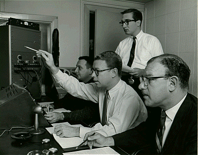 Arthur Rankin and Jules Bass, as well as recording supervisor Bernard Cowan, at a recording session for Rudolph the Red-Nosed Reindeer
