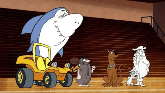 Scooby-Doo with fellow mystery solvers Jabberjaw, Speed Buggy, Captain Caveman, and the Funky Phantom (as seen in a crossover episode in the 2010-12 series "Mystery Incorporated").