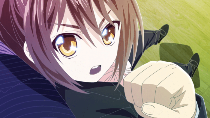 An agitated Chizuru is held back by her partner Hayate after Professor Makihara made an off-hand comment about age.