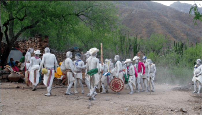 Painting completed, the Pharisees have returned to the village and are preparing for the festivities to begin.
