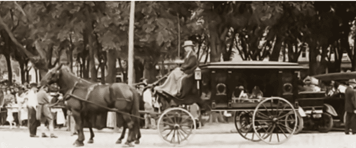 Horse drawn hearse brings Villisca murder victims to their final resting place. The interment was memorialized as the "funeral in the park".