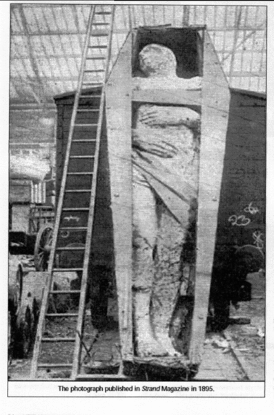 Crated, his anatomically correct bits discreetly covered by a cloth, the giant is ready for shipment.