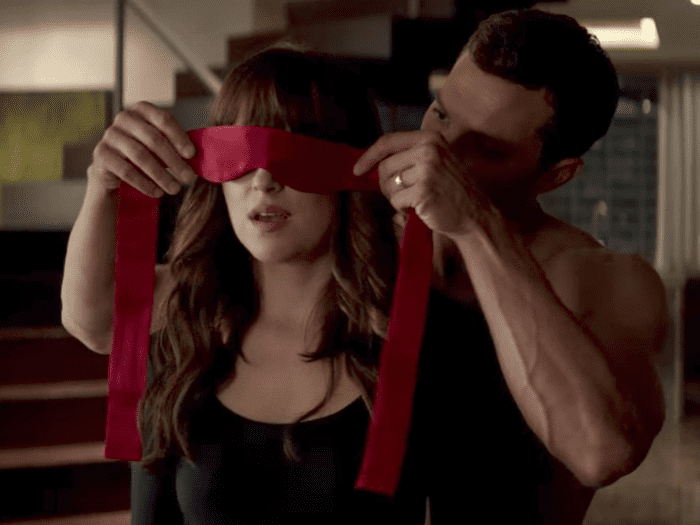 Jamie Dornan showing Dakota Johnson the proper way to watch any of the Fifty Shades films. "Close your eyes, open your mouth, and I'm going to make Fifty Shades Freed somewhat bearable."