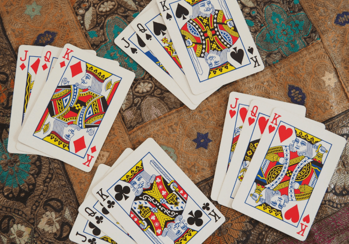 The face cards in a regular playing card deck correspond to court cards in a tarot deck. 
